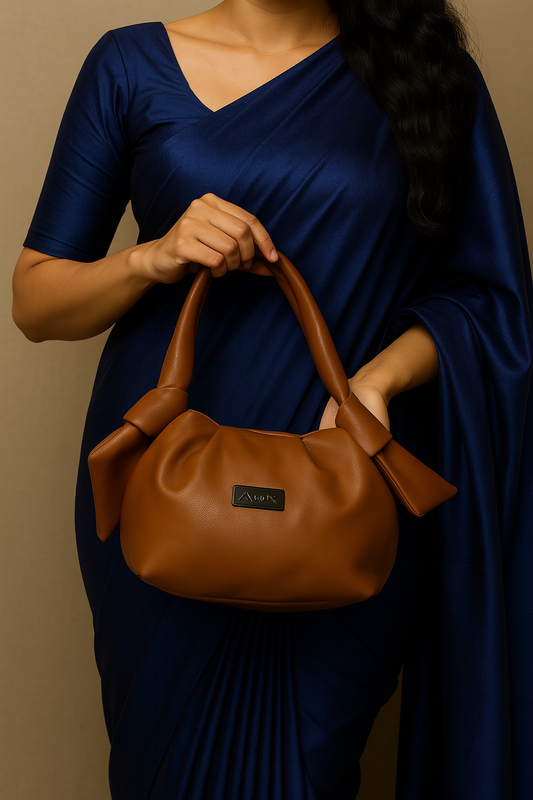 Brown leather handbag with sling