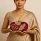 Mehroon embroidered oval shape hand clutch with sling
