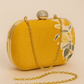 Gold yellow oval shape floral print hand clutch with sling