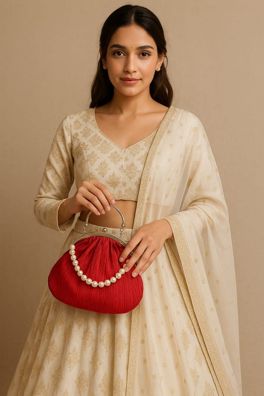 Red potli clutch with pearl handle