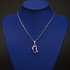 Blue Curve Crystal Pendant – Elegant Curved Teardrop Statement Necklace