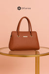 Brown dotted leather handbag with sling